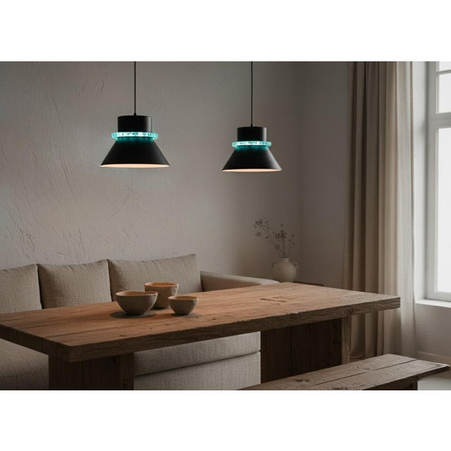 Rare Dutch pendant pair by Hiemstra Evolux, produced in the Netherlands circa 1960-1970. Architectural black lacquered...