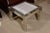 A rare Pierre Cardin end table in chrome with ceramic tile top, circa 1970. Four tiles in three shades of light grey...