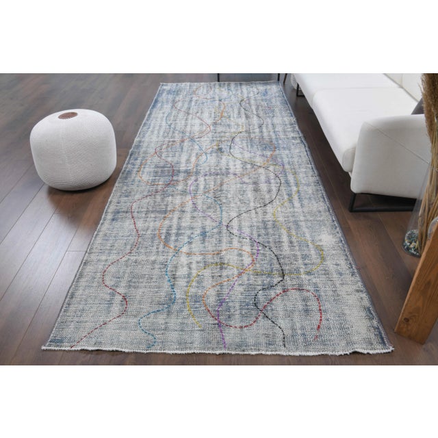 Vintage Turkish Hand-Knotted vintage rug is a vintage runner rug.'70s Eastern region of Turkey's unique rug is perfectly...