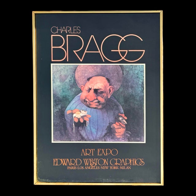 Vintage framed exhibition poster featuring the artwork “The Riddle” by American social satire artist Charles Bragg,...