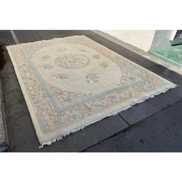 Design Plus Gallery presents a 9ft 6in x 13ft 5in Hand Woven Oushak Area Rug from Turkey. The rug has a thick pile of...