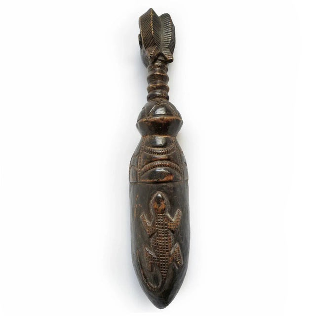 Old Grebo Dan spoon from Nigeria. Beautiful carving details and patina with signs of age and use. Lizard figure on the...