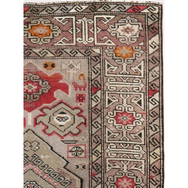 An antique Caucasian carpet from the turn of the 20th century.