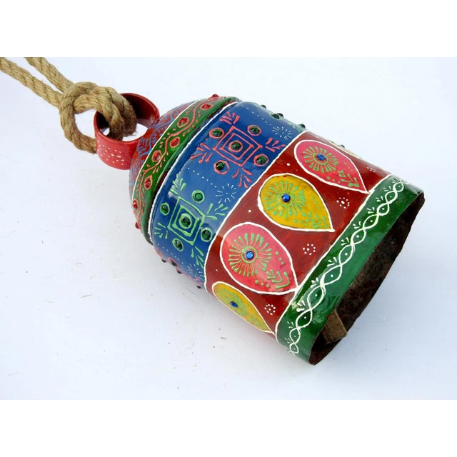 The bell is made of iron and coated primarily with copper, along with a few other metals. They are made from scrap iron...