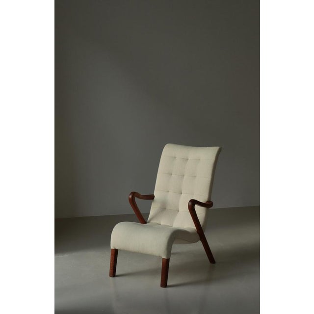 Danish Modern lounge chair "model no. 58" in patinated oak made at Slagelse Møbelværk in the late 1940s. Beautiful organic...