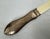 An antique, circa 1902, English sterling silver and bone page turner or paper knife trademarked “Deakin & Francis,...