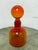 Design Plus Gallery presents an Italian Hand Blown Fire Orange Glass Decanter. A striking art glass decorative bottle...