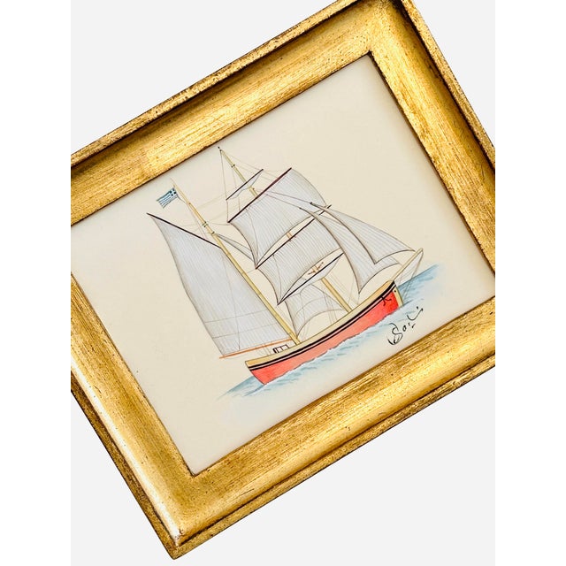 This hand-painted sailboat showcases beautifully detailed sails defined with fine linework that brings out the structure...