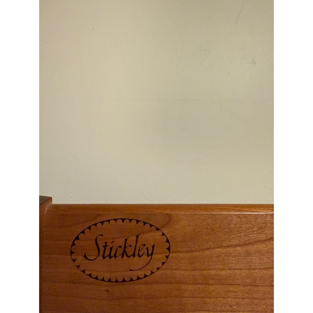 Bring enduring beauty and exceptional craftsmanship into your home with this stunning Stickley Tall Boy Chest. Renowned...