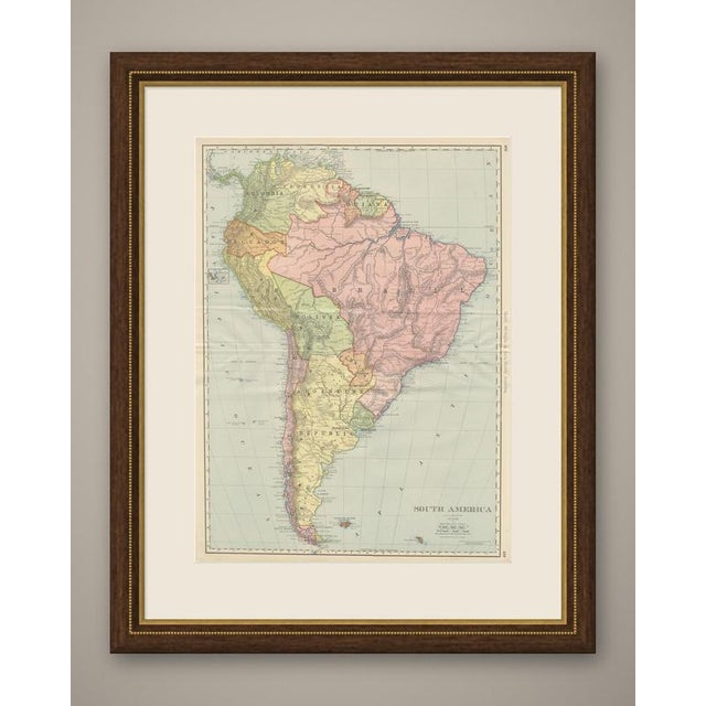 This antique map of South America, printed by Rand McNally in 1899 across pages 408 and 409 of its indexed atlas, runs the...