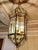 Monumental brass lantern lamp with beveled glass Origin: Museumplein townhouse, Amsterdam This impressive and heavy-duty...