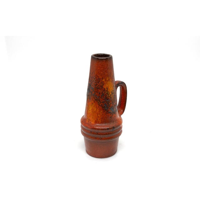 This striking vintage vase from Scheurich Keramik, West Germany, model 400-22, captivates with its black and deep orange...