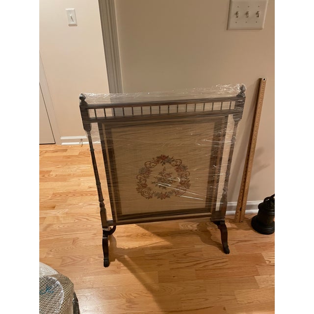Rare English mahogany and needlepoint fireplace screen. Handmade. In very good condition.
