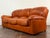 1970's Italian cognac leather sofa in good vintage condition. Minor scuffs consistent with age. Unsigned. Dimensions 81” x...