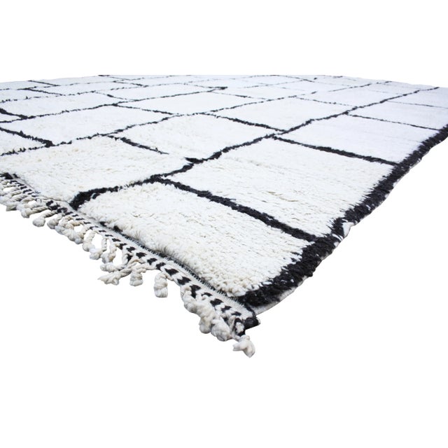 One-of-a-kind hand-knotted Moroccan rug in soft, organic wool with an elegant harlequin brick pattern. This gorgeous rug...