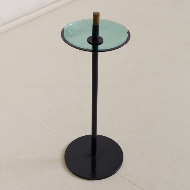 A rare Italian 'Model 2087' floor-standing catchall by Max Ingrand for Fontana Arte from the 1950s. Its refined silhouette...