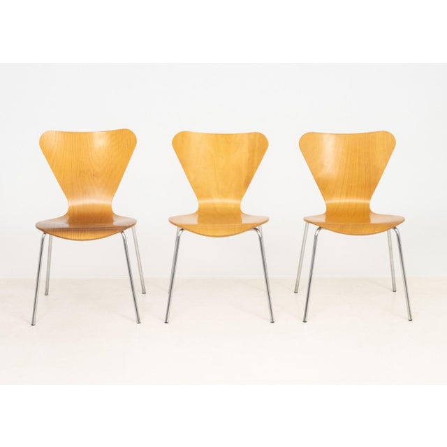 Set of Three Arne Jacobsen for Fritz Hansen Series 7 Side Chairs, plywood shells on tubular chrome legs. 31" H x 17.75" W...