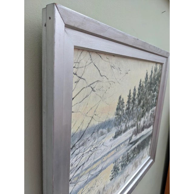 CRISP Size: 46.5 x 54.5 cm (including frame) Oil on canvas A captivating and serene winter landscape, executed in oil in...