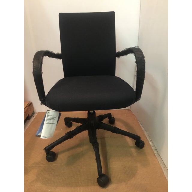 Vitra AC1 Part Number 41000200 The model AC1 swivel armchair was designed by famed Italian architect and designer Antonio...