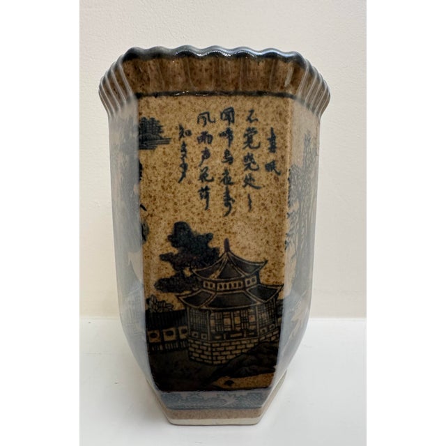 Chinoiserie in style with transfer-printed monochrome landscape scenes in dark black ink embody the entirety of the vase...