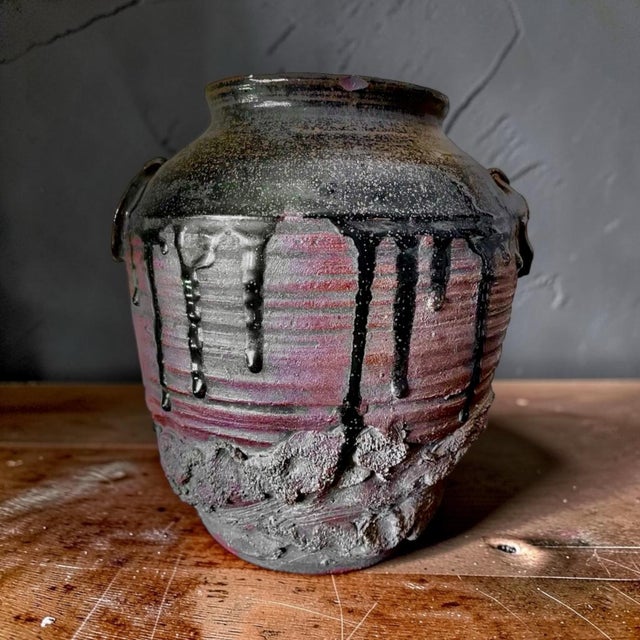 A Japanese glazed vessel from the Edo period. Made in the Tanba area since the 12th century, these ceramic and stoneware...