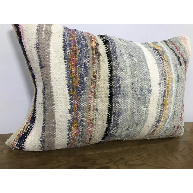 This is a vintage Turkish Anatolian kilim rug from the 1960s. The piece was hand-woven. Just cover no insert