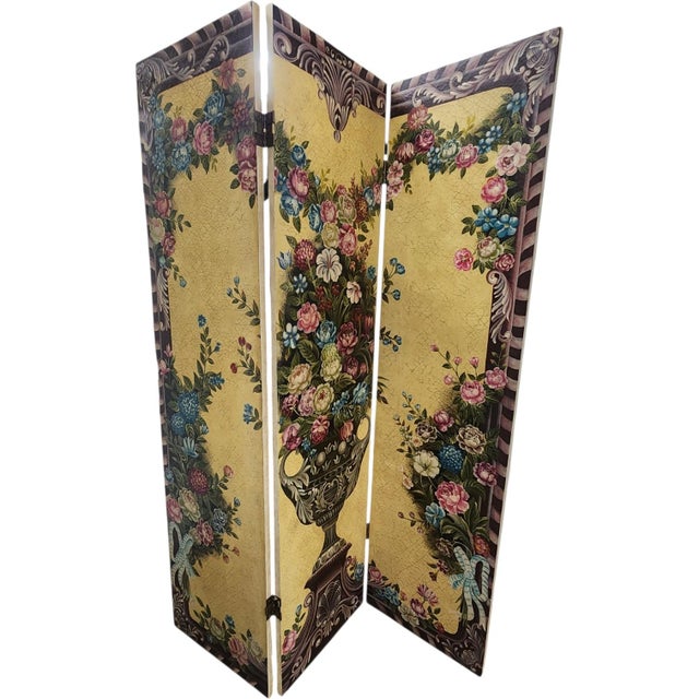 Striking vintage three-panel folding screen featuring an ornate Italianate-inspired floral design in warm yellow, cream,...