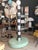 Memphis Floor Lamp with Shelves, attributed to Alessandro Mendini. It stands out for its central column structure with a...