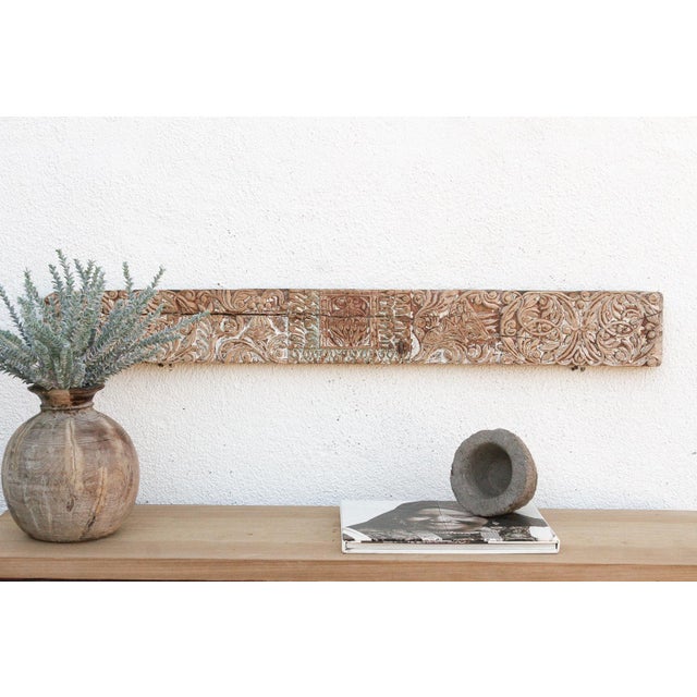 Uncover a piece of history with this authentic architectural carving, salvaged from the structures of 19th-century India....