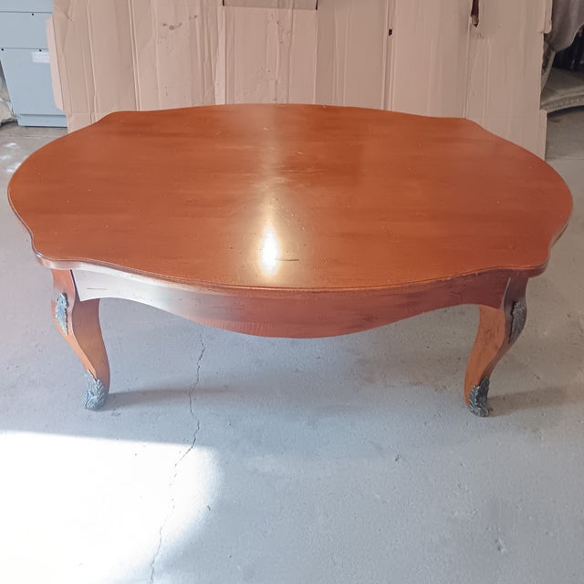 Vintage Solid Wood French Style Oval Coffee Table With Bronze Leaf Accents. A Classic and Timeless Beauty for your home....