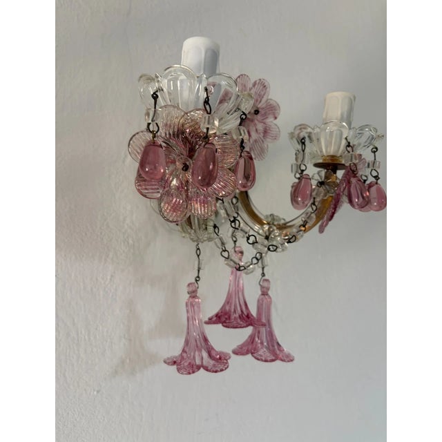 One of a kind set! Italian sconces housing 2 lights each, sitting in crystal bobeches with pink Murano balls encircling....
