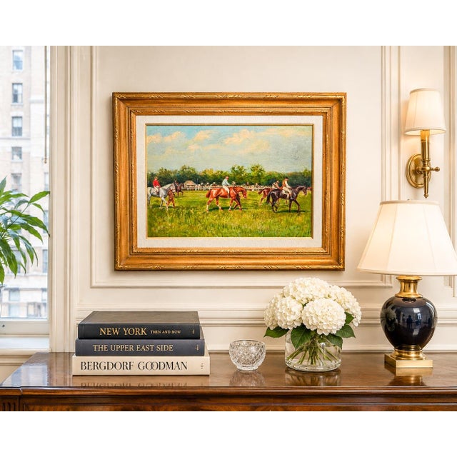 This captivating antique French oil painting presents a wonderfully atmospheric day at the racecourse, capturing horses...