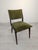 A "skopa" chair from the communist era in a mid-century style A vintage chair from the communist era, upholstered in a...