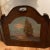 Triptych Arts & Crafts style folding firescreen with an original painting of a clipper ship on the water. Arched form with...