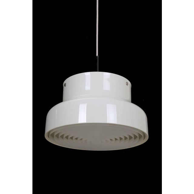 "bumling" pendant lamp. Design: anders pehrson for ateljé lyktan, åhus, 1968, sweden. Color: cream-white. Steel lampshade...