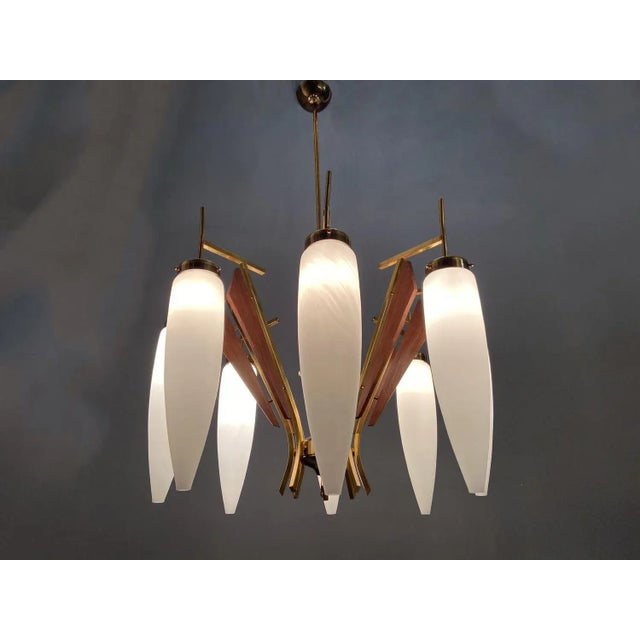 Stunning large stilnovo chandelier features 8 lights opaline white shades wooden veneer and brass frame height 102 cm...