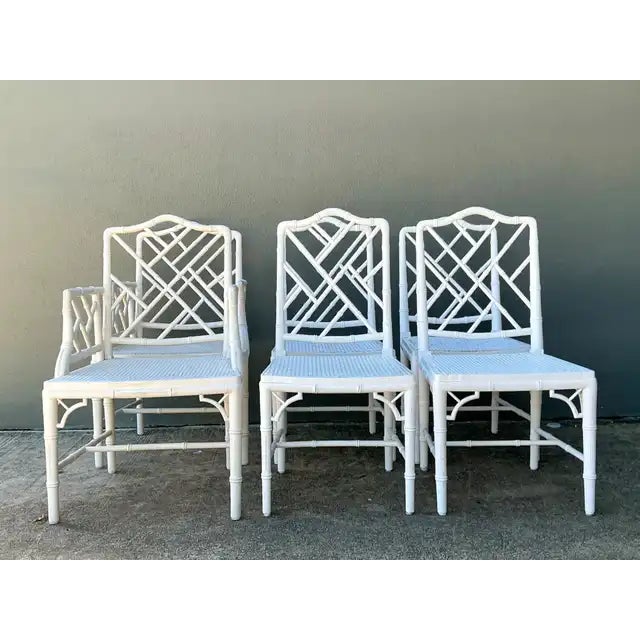 This set of six vintage Chinese Chippendale dining chairs combines traditional Chinese influence with the refined geometry...