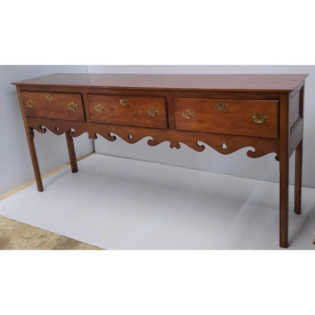 A 1978 Custom Made Wright Table Company's Chippendale Solid Yew Wood Sideboard. This extra long 80.5" in width, ( regular...