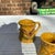 Up for consideration is a beautiful collection of yellow ceramic measuring cups with eagle accents. These would look...