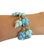 Vintage Lisner blue thermoset bracelet with safety chain. Blue and light teal leaves are gorgeous.