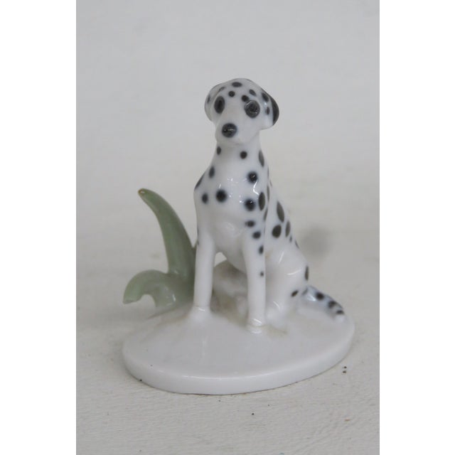 This darling Miniature Dalmatian Figurine is made of fine porcelain. This lovely dog figurine was made by the fine...
