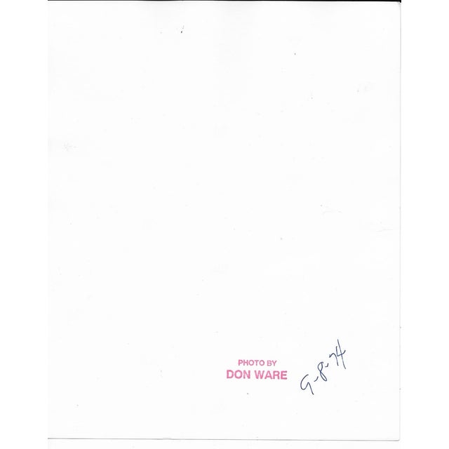 1974 black and white photograph by Los Angeles based photographer Don Ware of fire fighters in LA. Dated and bearing...