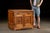 Antique carved oak cabinet with single drawer and double doors. Featuring a spacious interior with a single shelf, this...