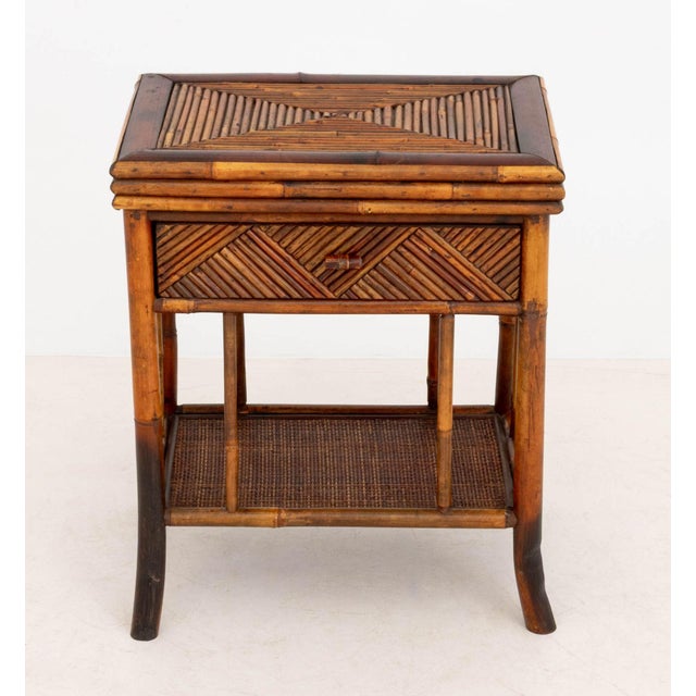 Aesthetic Movement Style Bamboo Side Table, with single drawer above an undertier. 24" H x 20.25" W x 14.25" D....
