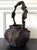 Large and robust in presence, this antique Japanese bamboo flower basket (ikebana) with tall handle is dated to the late...