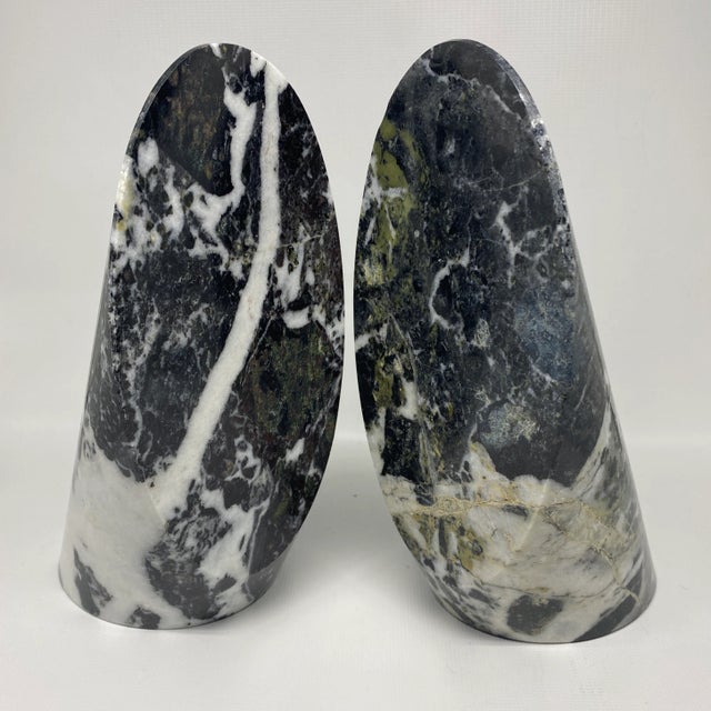 Stunning pair of vintage green marble bookends slanted to hold books or put them up against each other as a sculptural...
