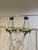 Simple yet elegant vintage cast bronze chandeliers with 3 ivory faux candlelights. Oil rubbed bronze finish.
