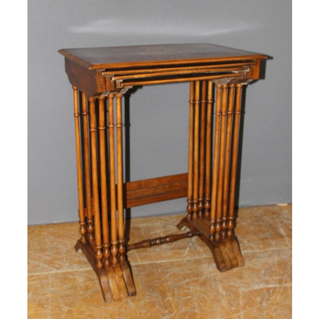 Set of four nesting tables in floral marquetry on a checkerboard background, measuring 73/70.5/69/67 cm in height,...