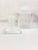 Elevate your bathroom counter or vanity table with this stunning 3-piece vintage vanity set. Crafted from lucite, this set...