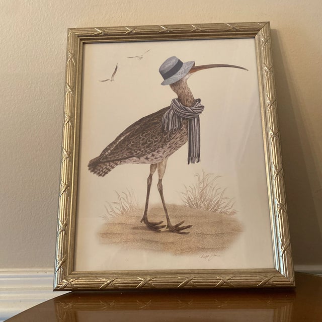 Very interesting pair of bird prints good looking size true his and hers, professionally framed and silver modern frames